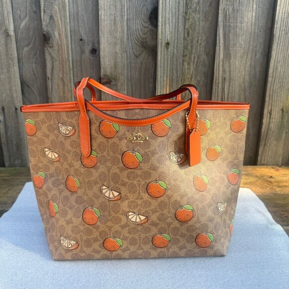 Coach Handbags - coach City Tote Bag In Signature Canvas With Orange Print cal74